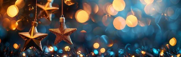 Golden Star Ornaments Hanging Against a Blurred Background of Lights photo