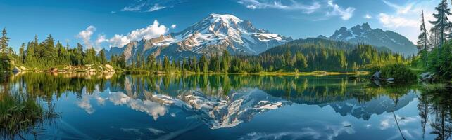 Majestic Mount Rainier Reflecting in Still Waters of a Mountain Lake photo