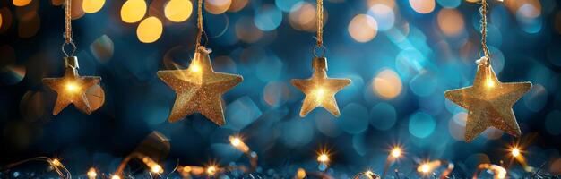 Golden Star Christmas Ornaments Hanging on Blue Background With Lights photo