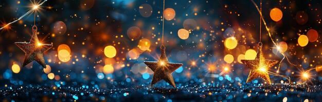 Golden Star Ornaments Hanging Against a Blurred Background of Lights photo