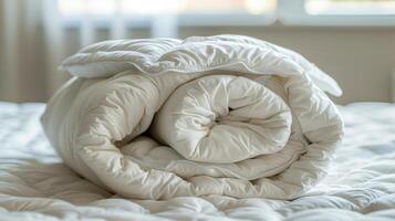 Unmade Bed With White Comforter photo