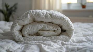 White Comforter on Bed photo