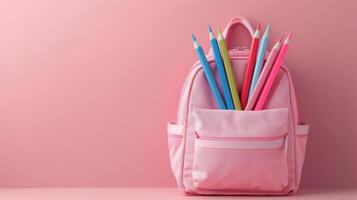 Pink Backpack Overflowing With Pencils photo