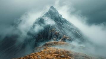 Snow-Covered Tall Mountain Under Cloudy Sky photo