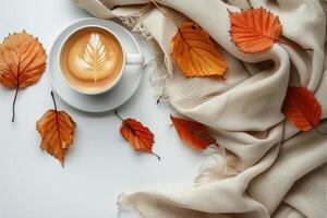 A Cozy Autumn Morning With a Cup of Latte and a Knit Blanket photo