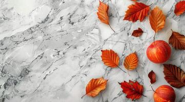 Colorful Autumn Leaves Scattered On Marble Surface photo