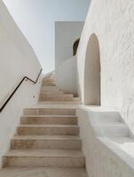 White Stone Steps Leading Up to an Archway in a Modern Building photo