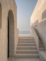 White Stone Steps Leading Up to an Archway in a Modern Building photo