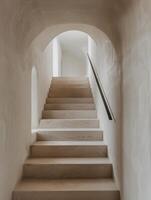 Concrete Staircase With Black Handrail in Modern Building Interior photo