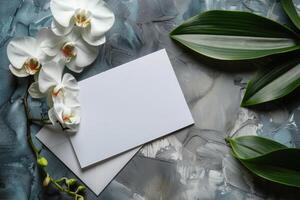 White Orchid Flower on Stack of Paper With Linen Fabric photo