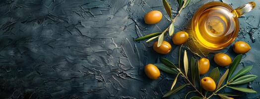 Fresh Olive Branch and Oil on Dark Textured Background photo