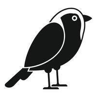 Black and white bird standing watching looking forward icon vector