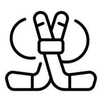 Two crossed hockey sticks with puck moving around them icon vector