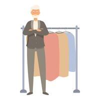Senior tailor standing next to clothes rack posing with arms crossed vector