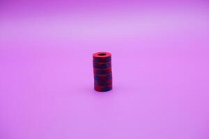 circle magnet isolated on purple background photo