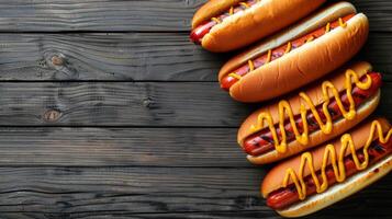 Four Hot Dogs With Mustard and Ketchup photo