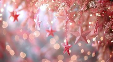 Pink Star Ornaments Hanging On Christmas Tree photo