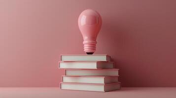 Pink Lightbulb on Stack of Books photo