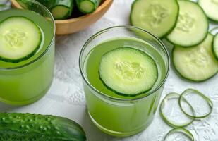 Refreshing Cucumber Mint Beverage With Sliced Cucumbers photo