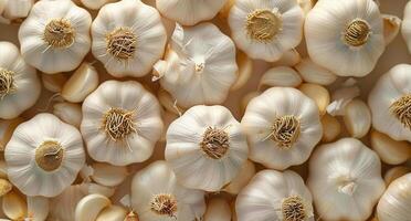 A Collection of Whole Garlic Cloves on a White Surface photo