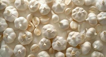 A Collection of Whole Garlic Cloves on a White Surface photo