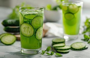 Refreshing Cucumber Mint Beverage With Sliced Cucumbers photo