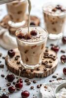 Iced Coffee With Whipped Cream and Cherries on a Wooden Board photo