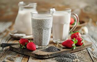 Chia Seed Pudding With Milk and Strawberries on Wooden Cutting Board photo