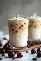 Iced Coffee With Whipped Cream and Cherries on a Wooden Board photo