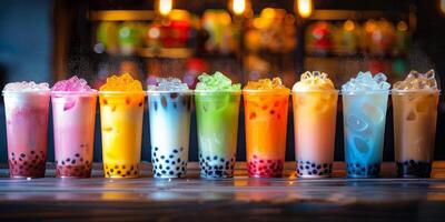 Colorful Bubble Tea Drinks With Tapioca Pearls and Ice in Plastic Cups photo