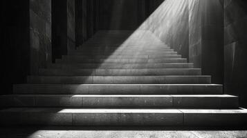 Stone Stairs Illuminated by Sunlight in a Dark Hallway photo
