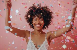 Woman With Short Curly Hair Smiling in Confetti photo