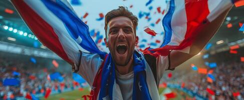 Excited Fan Cheers With National Flag During Stadium Event photo