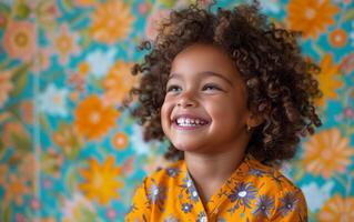 Portrait of a Young Girl With Curly Hair Laughing in Front of a Colorful Background photo