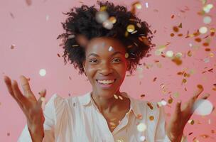 Happy Woman Celebrating With Confetti in Studio photo