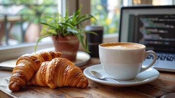 Freshly Baked Croissant and Cappuccino on a Sunny Morning Table photo