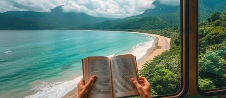 Person Reading Book on Train With Coastal View in Japan photo