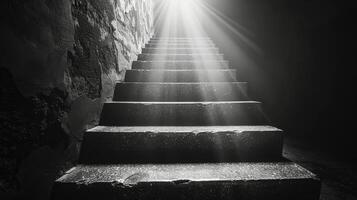 Stone Stairs Illuminated by Sunlight in a Dark Hallway photo