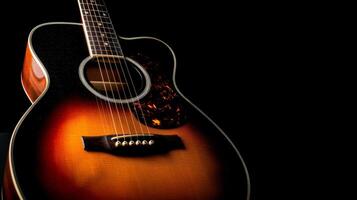 Close-up of an acoustic guitar with a sunburst finish photo