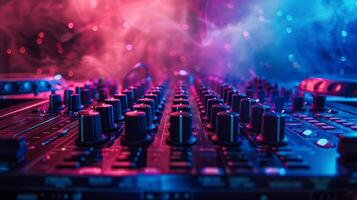 A close-up of a soundboard with glowing knobs photo