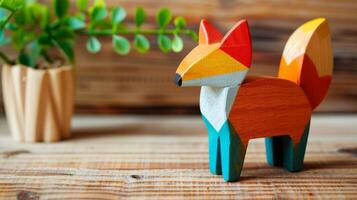 A colorful, geometric wooden fox toy on a wooden table photo