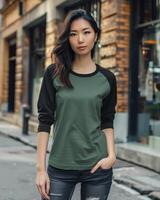 Woman in a green and black raglan shirt photo