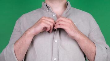 man buttoning up. High quality 4k footage video