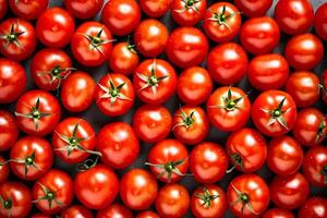 Bunch of fresh red tomatoes from top angle representing a background photo