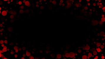 Red color particles frame with empty space on black background video