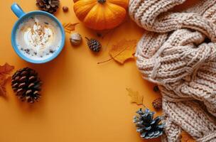 Cozy Autumn Scene With Knitted Scarves, Pumpkins, And A Cup Of Coffee photo