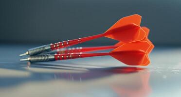 Closeup of Red Darts Stuck in a Dartboard photo