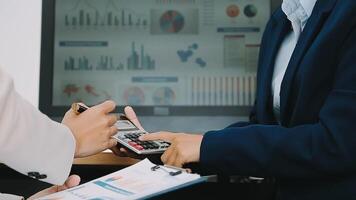 Group of business people discussing finance and investment during the meeting. video