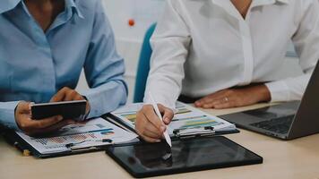 Group of business people discussing finance and investment during the meeting. video