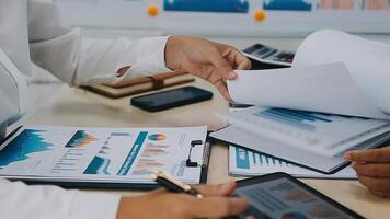 Group of business people discussing finance and investment during the meeting. video